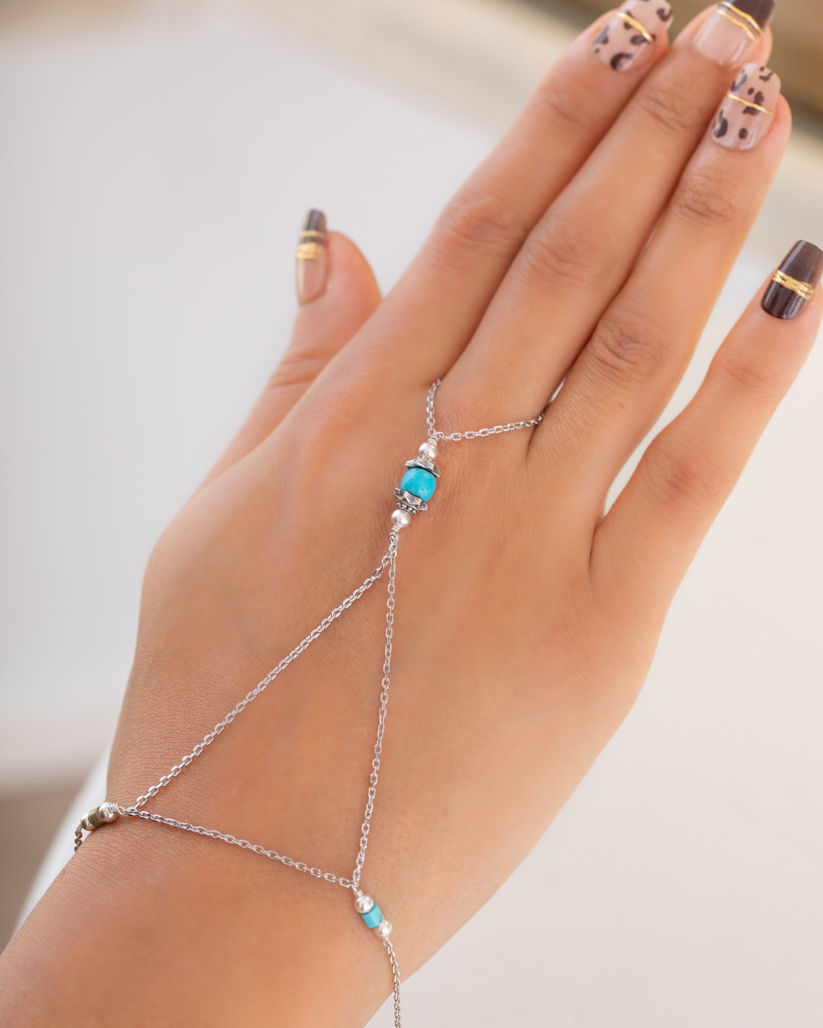 Turquoise fanos Handchian