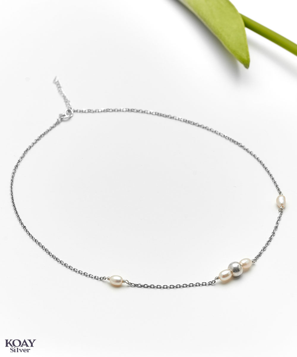 Ball And Pearl Necklace