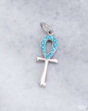 Turquoise Zircon Key Pendant