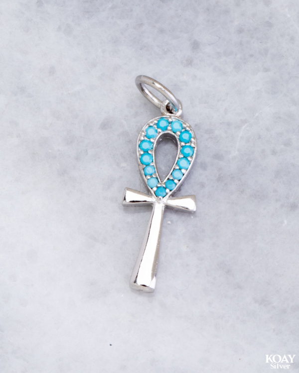 Turquoise Zircon Key Pendant